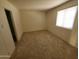 Simple carpeted bedroom with window at 3314 N 68Th St # 204, Scottsdale, AZ 85251