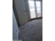 Bright bedroom with carpet flooring and French doors leading to a balcony at 3314 N 68Th St # 204, Scottsdale, AZ 85251