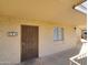 Building exterior, showing unit entrance with security gate at 3314 N 68Th St # 204, Scottsdale, AZ 85251