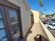 Private patio with access to building and parking lot views at 3314 N 68Th St # 204, Scottsdale, AZ 85251