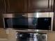 Stainless steel built-in microwave above stovetop at 3314 N 68Th St # 204, Scottsdale, AZ 85251