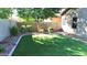 Artificial turf lawn with gravel border and small plants at 901 W Witt Ave, Queen Creek, AZ 85140