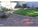Artificial turf lawn with gravel border and walkway at 901 W Witt Ave, Queen Creek, AZ 85140