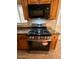 Modern Frigidaire gas range and microwave at 3542 E Earll Dr, Phoenix, AZ 85018