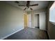 Spacious bedroom with closet, carpet, and access to hallway at 3542 E Earll Dr, Phoenix, AZ 85018