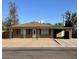 Ranch style home with front yard and carport at 3542 E Earll Dr, Phoenix, AZ 85018