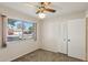 Well-lit bedroom with a large window and built-in closet at 2015 W Wescott Dr, Phoenix, AZ 85027