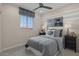 Bright bedroom with a comfy bed, nightstands, and window coverings at 9243 E Sector Dr, Mesa, AZ 85212