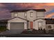 Two-story house with beige walls and terracotta roof at 9243 E Sector Dr, Mesa, AZ 85212