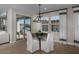 Bright dining room with round table and chandelier at 9237 E Sector Dr, Mesa, AZ 85212