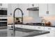 Sleek kitchen with a modern sink and faucet at 9237 E Sector Dr, Mesa, AZ 85212