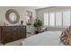 Spacious main bedroom with large windows and dresser at 9237 E Sector Dr, Mesa, AZ 85212