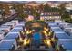 Aerial view of townhouses and community pool at night at 5151 N 13Th Pl # 4, Phoenix, AZ 85014