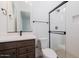 Clean bathroom with a walk-in shower and modern vanity at 3823 W Lodge Dr, Laveen, AZ 85339