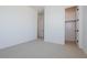 Spacious bedroom with neutral walls, carpet, and walk-in closet at 3823 W Lodge Dr, Laveen, AZ 85339