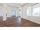 Open concept living area with views of backyard and entryway at 3823 W Lodge Dr, Laveen, AZ 85339