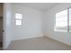 Spacious bedroom with large windows and neutral decor at 3823 W Lodge Dr, Laveen, AZ 85339