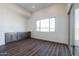 Bright dining area with patio access and dark wood floors at 3823 W Lodge Dr, Laveen, AZ 85339