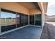 Covered patio with sliding glass doors and mountain views at 3823 W Lodge Dr, Laveen, AZ 85339