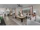 Open living room featuring a spacious layout, plush seating, and large windows at 9233 E Sector Dr, Mesa, AZ 85212