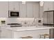 Stylish kitchen island with white quartz countertops at 9233 E Sector Dr, Mesa, AZ 85212