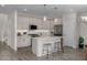 Modern kitchen boasting stainless steel appliances and an island at 9233 E Sector Dr, Mesa, AZ 85212