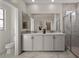 Elegant bathroom with double vanity and large walk-in shower at 9233 E Sector Dr, Mesa, AZ 85212