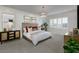 Spacious main bedroom with plush bed and plenty of natural light at 9233 E Sector Dr, Mesa, AZ 85212