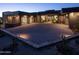 Modern home with a spacious driveway and elegant landscaping at 10284 E Running Deer Trl, Scottsdale, AZ 85262