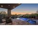 Stunning pool and spa with a beautiful sunset view at 10284 E Running Deer Trl, Scottsdale, AZ 85262