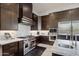 Modern kitchen with stainless steel appliances and marble countertops at 10284 E Running Deer Trl, Scottsdale, AZ 85262