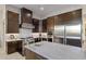 Modern kitchen with stainless steel appliances and marble countertops at 10284 E Running Deer Trl, Scottsdale, AZ 85262