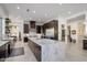 Spacious kitchen with island, stainless steel appliances, and custom cabinetry at 10284 E Running Deer Trl, Scottsdale, AZ 85262