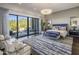 Spacious main bedroom with sitting area and access to a private patio at 10284 E Running Deer Trl, Scottsdale, AZ 85262