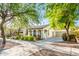One-story home with front porch and nicely landscaped yard at 20431 W Lost Creek Dr, Buckeye, AZ 85396
