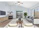 Virtually staged living room with fireplace and patio access at 45 E 9Th Pl # 36, Mesa, AZ 85201