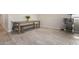 Simple dining area with wood table and bench seating at 1952 N 212Th Ln, Buckeye, AZ 85396
