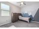 Cozy bedroom with mountain mural and built-in dresser at 1952 N 212Th Ln, Buckeye, AZ 85396
