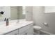 Clean bathroom with white vanity and toilet at 1952 N 212Th Ln, Buckeye, AZ 85396