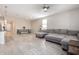 Open concept dining area with wooden table and bench seating at 1952 N 212Th Ln, Buckeye, AZ 85396