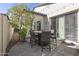 Stone patio with a dining table and chairs at 20431 W Lost Creek Dr, Buckeye, AZ 85396