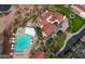 Resort-style pool and clubhouse with lush landscaping at 13668 W Figueroa Dr, Sun City West, AZ 85375