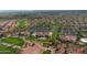 Community overview showing homes, golf course, and clubhouse at 13668 W Figueroa Dr, Sun City West, AZ 85375