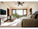 Main bedroom with private balcony and stunning mountain views at 20567 N 112Th St, Scottsdale, AZ 85255
