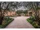 Grand entrance with paved driveway and lush landscaping at 20567 N 112Th St, Scottsdale, AZ 85255