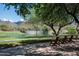 Tranquil pond with seating area and mountain views at 20567 N 112Th St, Scottsdale, AZ 85255