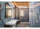 Spa-like outdoor shower with marble walls and a modern design at 20567 N 112Th St, Scottsdale, AZ 85255