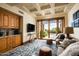 Comfortable recreation room with a wet bar and access to patio at 20567 N 112Th St, Scottsdale, AZ 85255