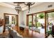 Spacious dining room with French doors opening to a private patio at 20567 N 112Th St, Scottsdale, AZ 85255