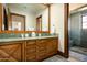 Guest bathroom with double sinks and a walk-in shower at 20567 N 112Th St, Scottsdale, AZ 85255